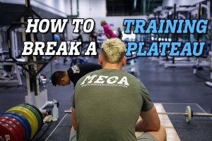 a man sitting in a gym with a text overlay that says how to break a plate