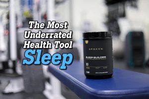 A container of the sleep aid supplement sleep builder made by spoken nutrition with text that says "The Most Underrated Health Tool Sleep"